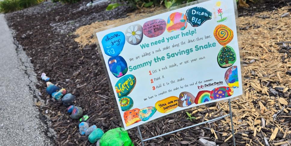 Sammy the Savings Snake at the Glasford branch Paint a rock and add it to the snake in the drive-up lane